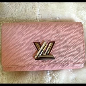 Louis Vuitton unique twist leather bag with chain